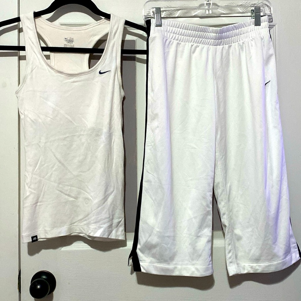 NIKE DRY-FIT WHITE CAPRIS LENGTH PANTS WITH MATCHING WHITE TANK TOP.